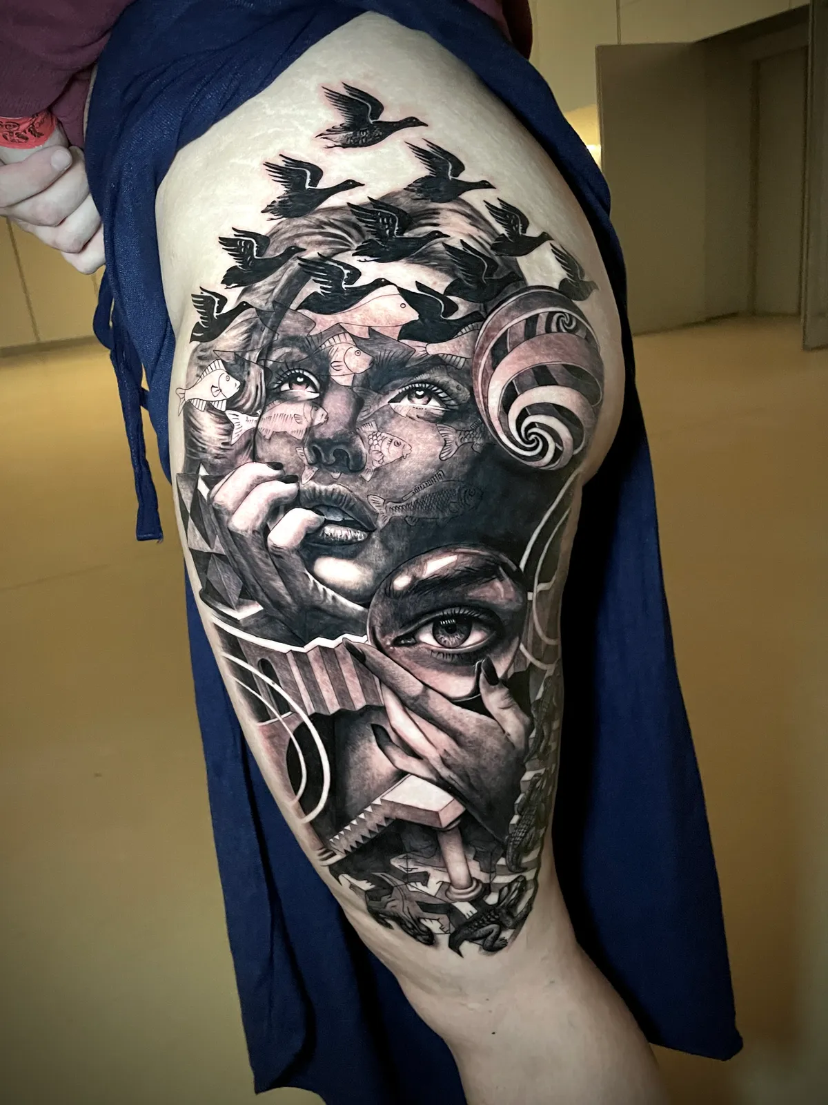 Black and grey surrealism woman portrait with birds, eye and spiral elements large scale tattoo by Andras Tattoo
